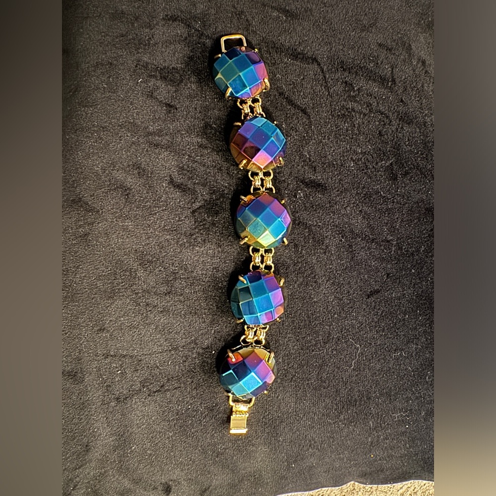 Cassie black iridescent bracelet with gold gold over closure